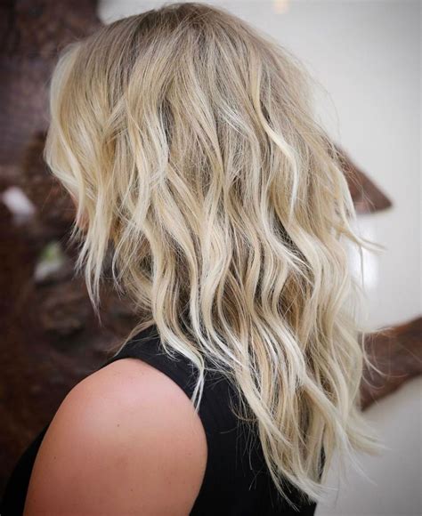 The Allure of Wavy Blonde Layered Hair