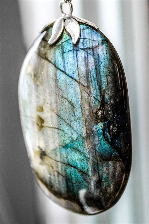 The Alluring Enigma of Labradorite: Uncovering Nature's Shimmering Gemstone