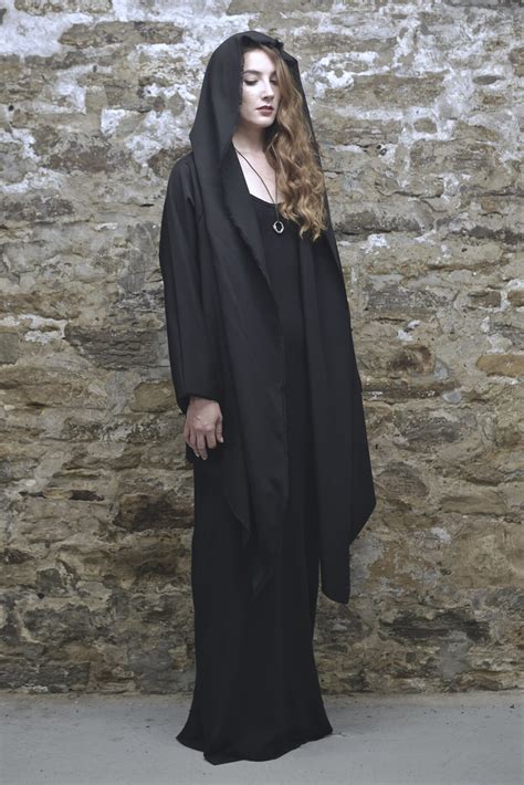 The Black Coat: A Shroud and a Uniform