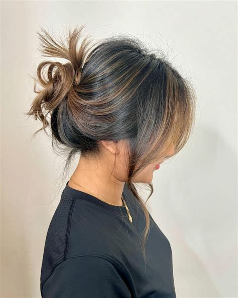 The Enchanting Allure of the Messy Bun: An Ode to the Effortless Elegance