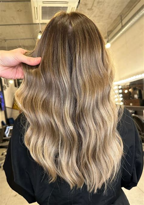 The Essence of Dark Blonde Balayage