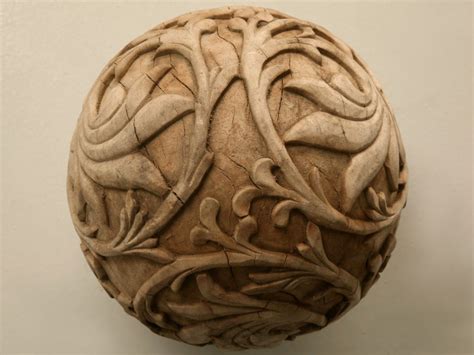 The History of Carved Wooden Spheres