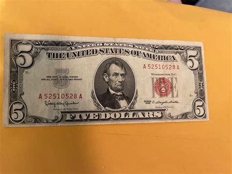 The History of the $5 Bill with Red Writing