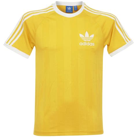 The History of the Adidas Yellow Shirt