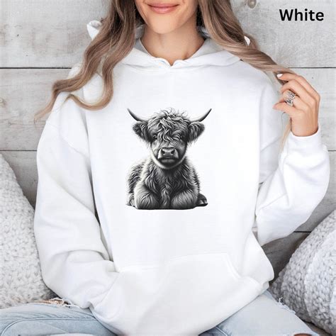 The Science Behind the Warmth: Exploring the Benefits of Highland Cow Sweatshirts