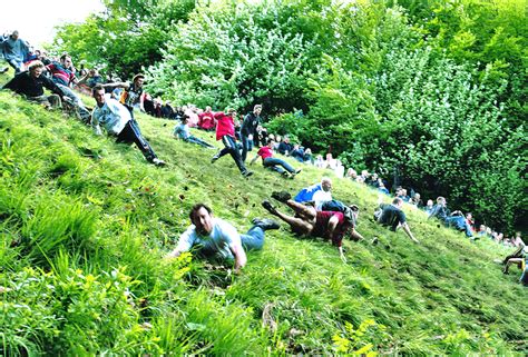 The Thrilling Descent of Cooper's Hill: A Comprehensive Guide to the Cheese-Rolling Festival