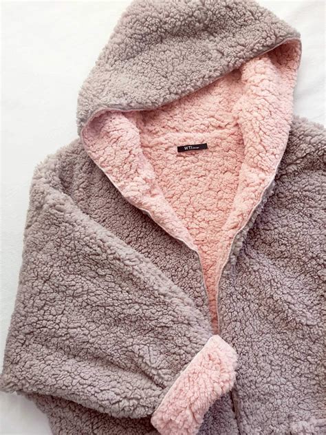 The Ultimate Guide to Choosing and Enjoying a Fluffy Jacket with Hood: A Comprehensive Exploration