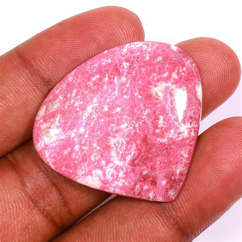 Thulite Crystal: A Pink Gemstone with Hidden Treasures