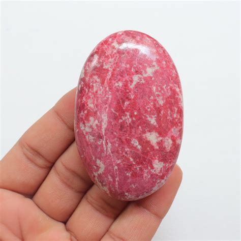 Thulite Stone: Uncover the Enchanting World of Pink Serenity