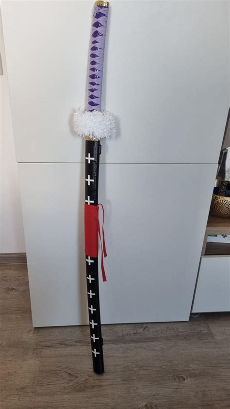 Trafalgar D. Water Law's Sword: A Blade of Justice and Redemption