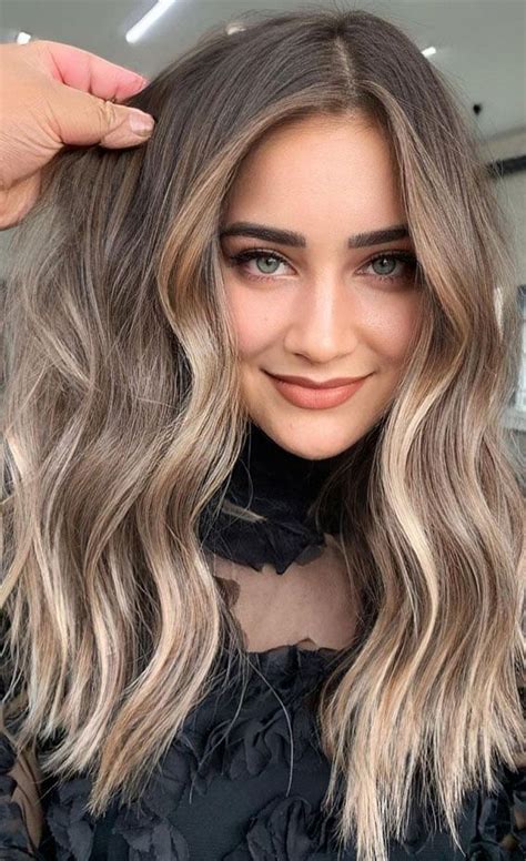 Transforming Mousy Brown to Vibrant Hues: A Comprehensive Guide to Hair Colour Magic