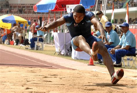 Transition: Delving into the Science of Long Jump Spikes