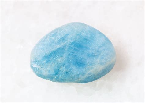 Tumbled Aquamarine: Unveiling the Enigmatic Beauty of a Marine Gem