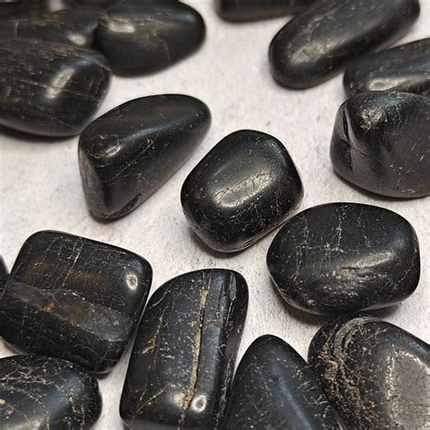 Tumbled Black Tourmaline: A Comprehensive Guide to Its Properties, Benefits, and Applications