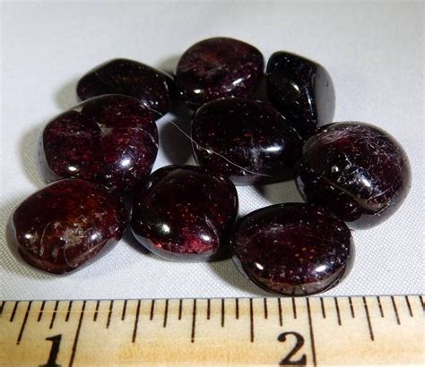 Tumbled Garnet: Uncover the Enchanting Properties of This Gemstone