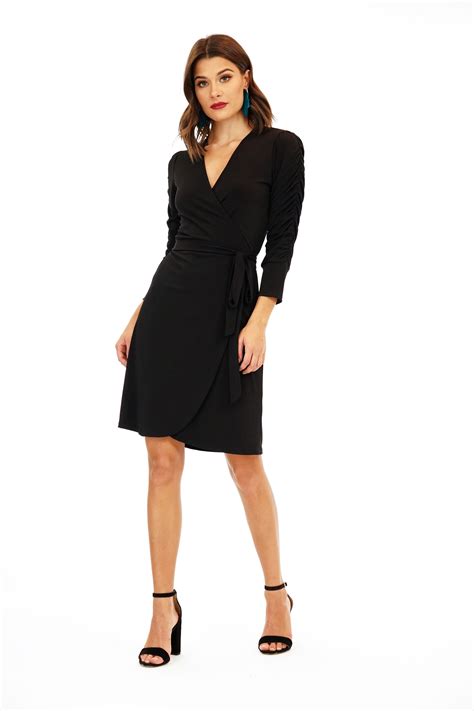 Understanding the Allure of the Black Wrap Dress