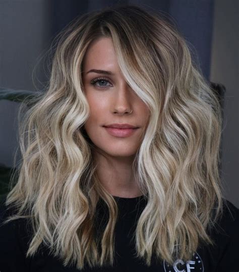 Understanding the Appeal of Dark Roots, Blonde Hair