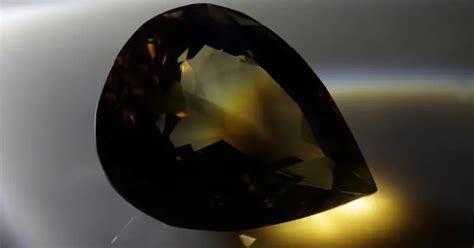 Understanding the Energetics of Smoky Quartz