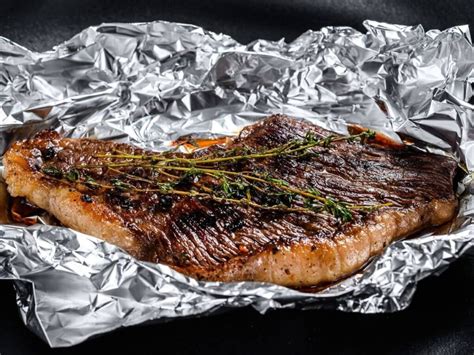 Unleash Culinary Magic: Elevate Your Grilling with Foil-Wrapped Steaks