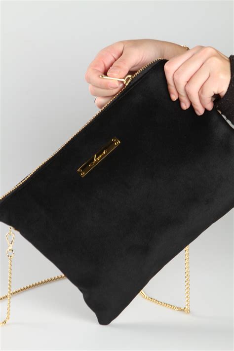 Unleash Your Sophisticated Style with the Alluring Black Suede Bag