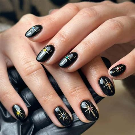 Unleash the Allure of Black and Gold Nails: A Guide to Striking Nail Art