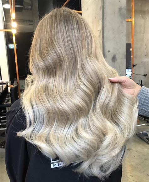 Unleashing the Allure of Ash Blonde Extensions