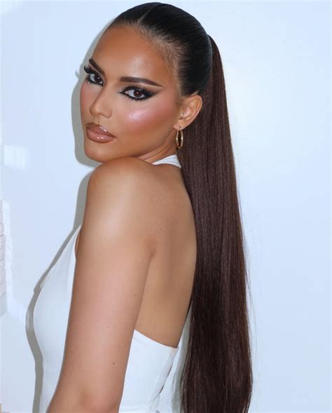 Unlock the Queen's Crown: Elevate Your Style with the Majestic Middle Part High Ponytail