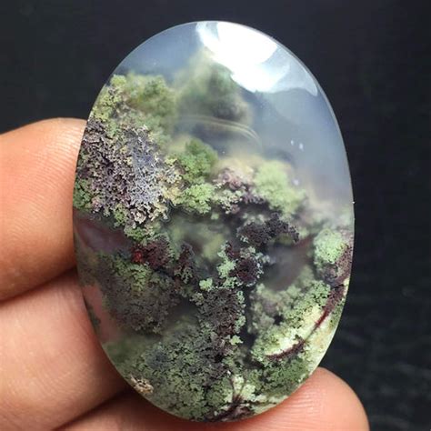 Unveiling Tumbled Moss Agate's Captivating Wonders