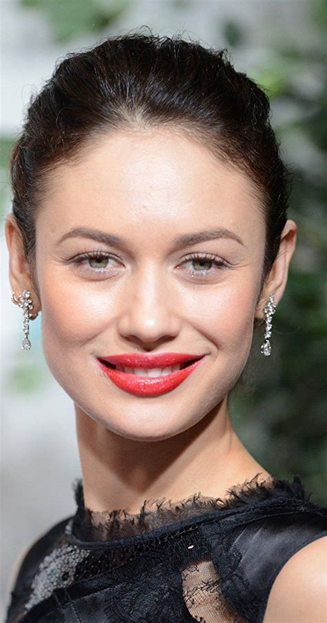 Unveiling the Enigmatic Beauty of Olga Kurylenko: A Journey of Empowerment and Grace