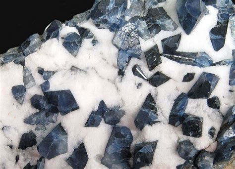 Unveiling the Enigmatic Nature of Greyish White Crystals