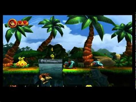 Use Donkey Kong's ground pound to break through weak floors and uncover hidden areas.