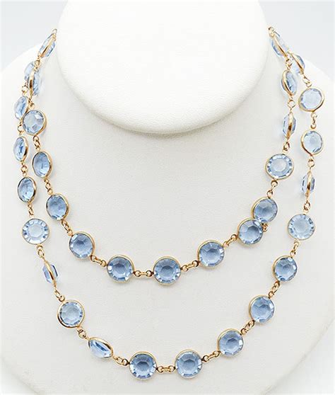 Wear light blue crystal jewelry: