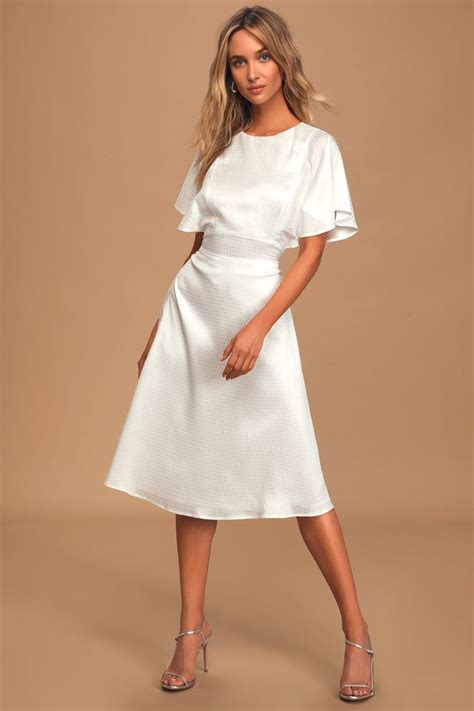 White Party Dress with Sleeves: A Guide to Elegant and Modest Attire