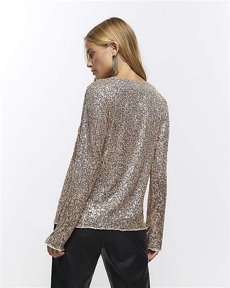 Why Sparkly Long Sleeve Tops Matter