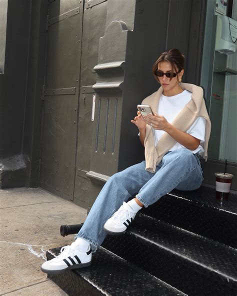 With jeans and sneakers.