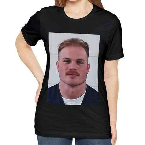 Zach Bryan Mugshot Shirt: A Symbol of Americana and Redemption