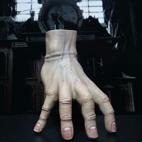 addams family hand thing