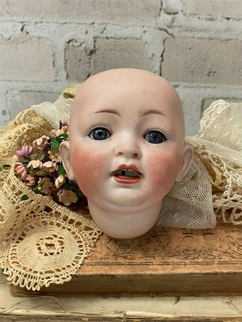 antique doll heads