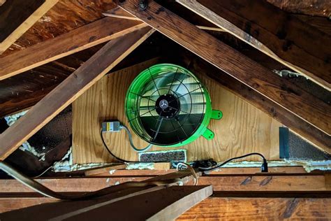 Attic access: installing a ceiling fan brace between joists
