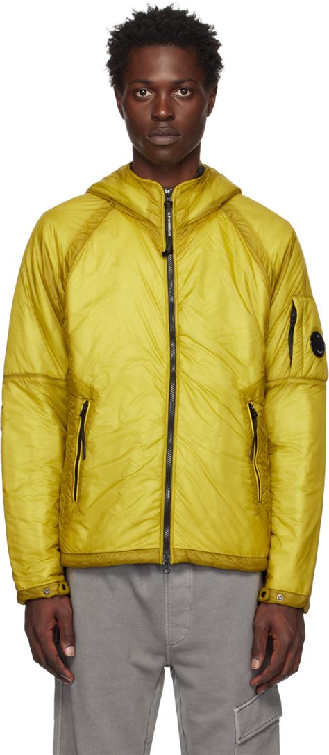 bag over head man ellow coat