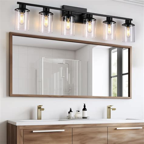 Comparison image of sconces vs light bar vs overhead