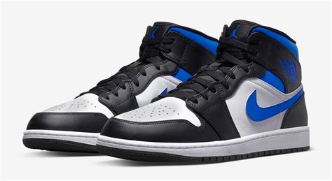 black and blue and white Jordans