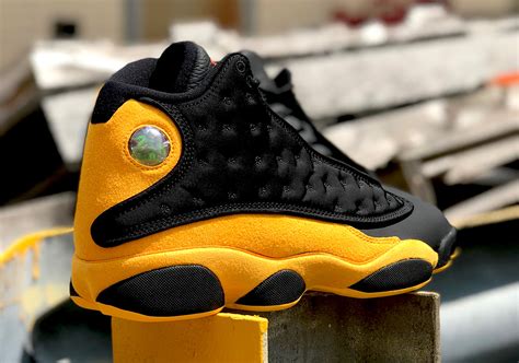 black yellow 13 jordans