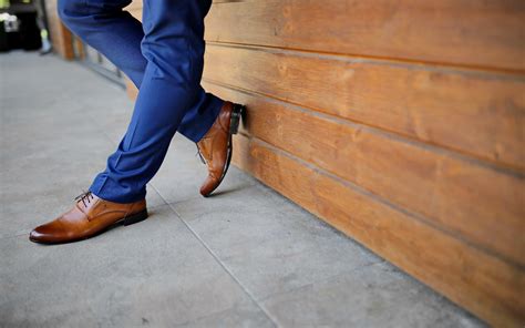 blue pants and brown shoes