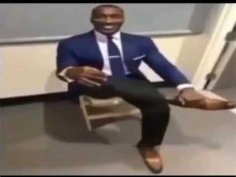 buff black guy sitting down meme