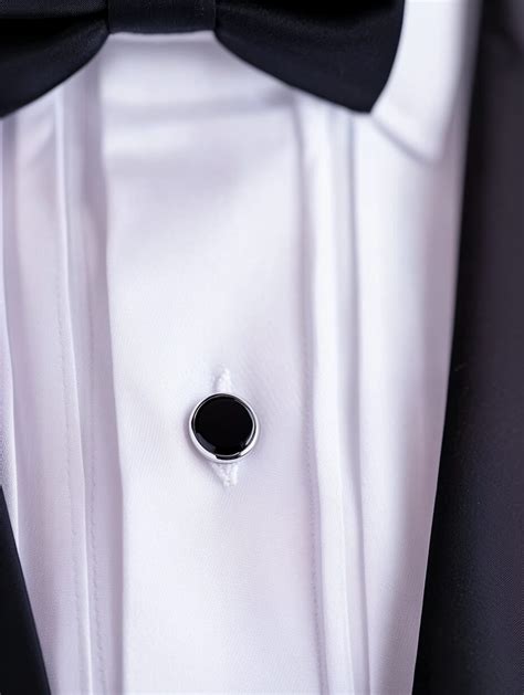 buttons on a tuxedo shirt