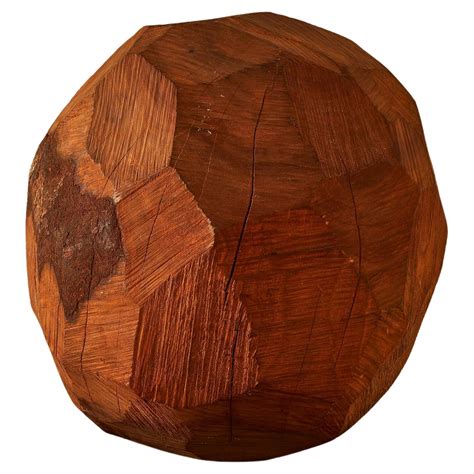 carved wooden sphere