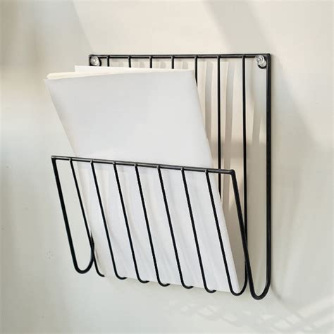 Catalog Holder That Hangs From Wall