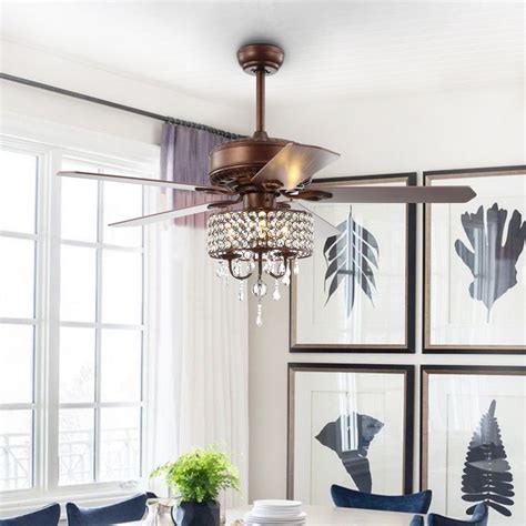 Side-by-side view of a traditional ceiling fan and a fandelier highlighting blade differences