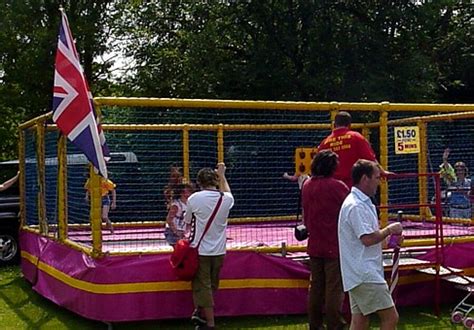 clowns carrying a trampoline for fire